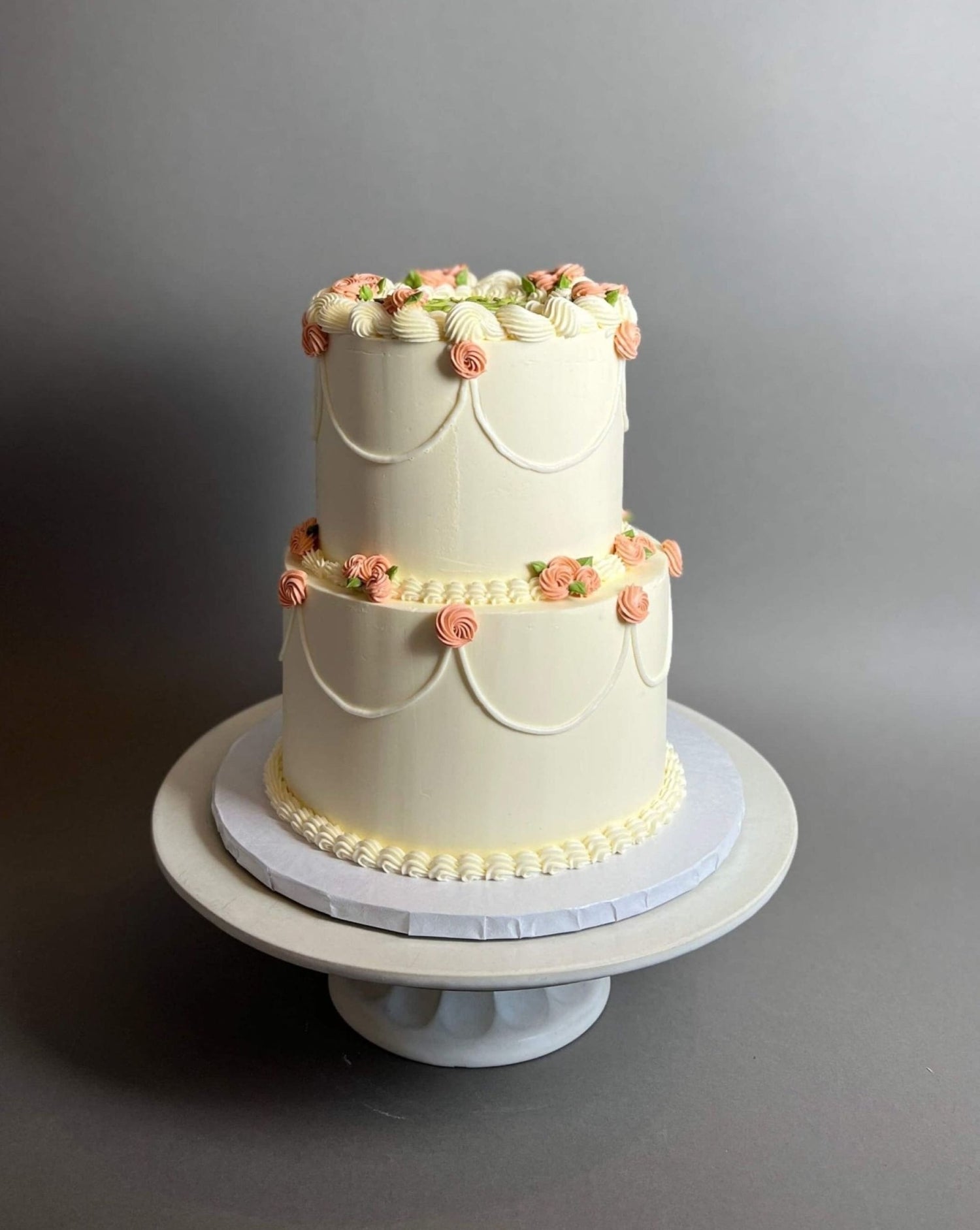 Hand piped mini rosettes on buttercream - custom cake