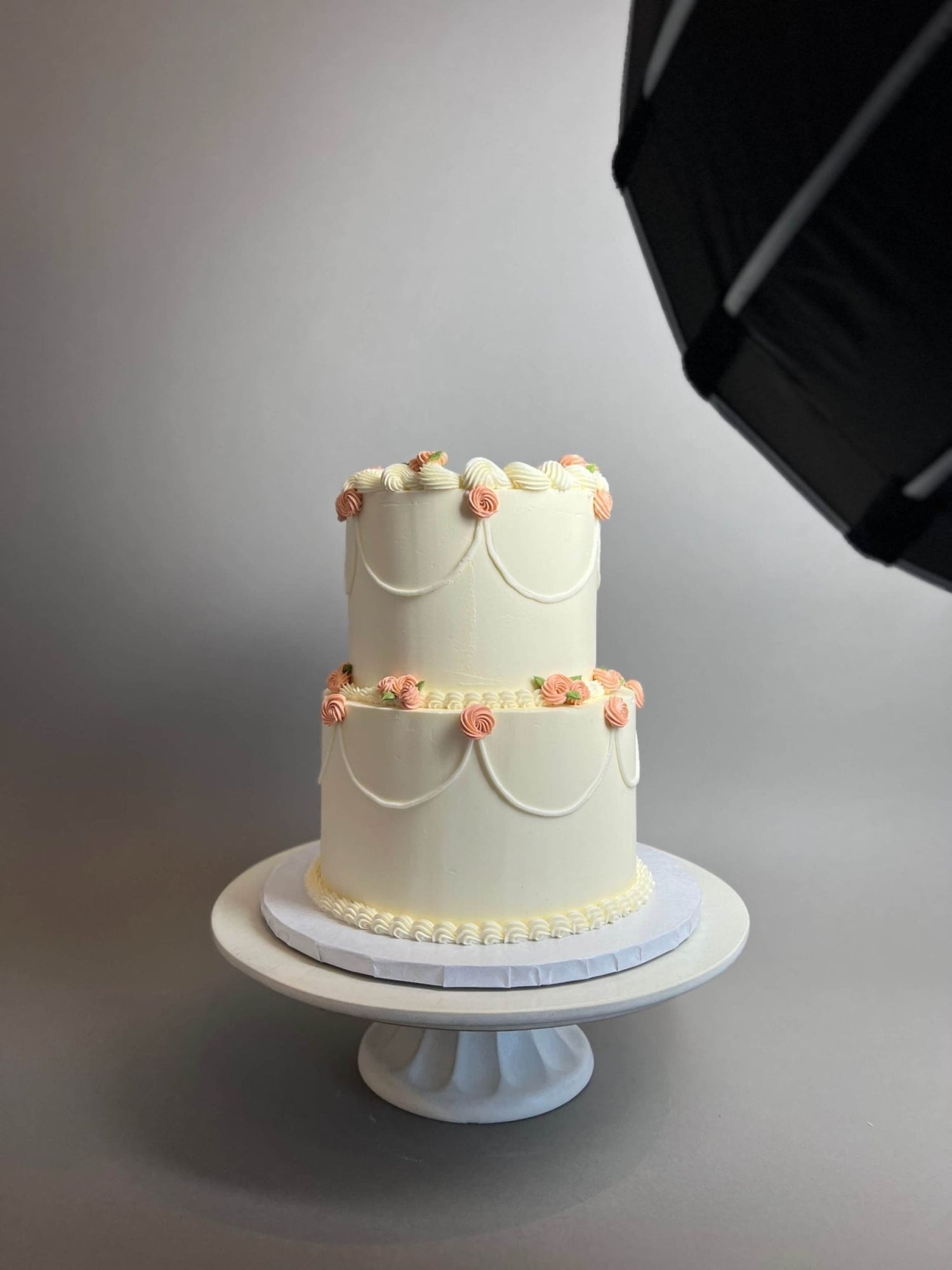 Hand piped mini rosettes on buttercream - custom cake