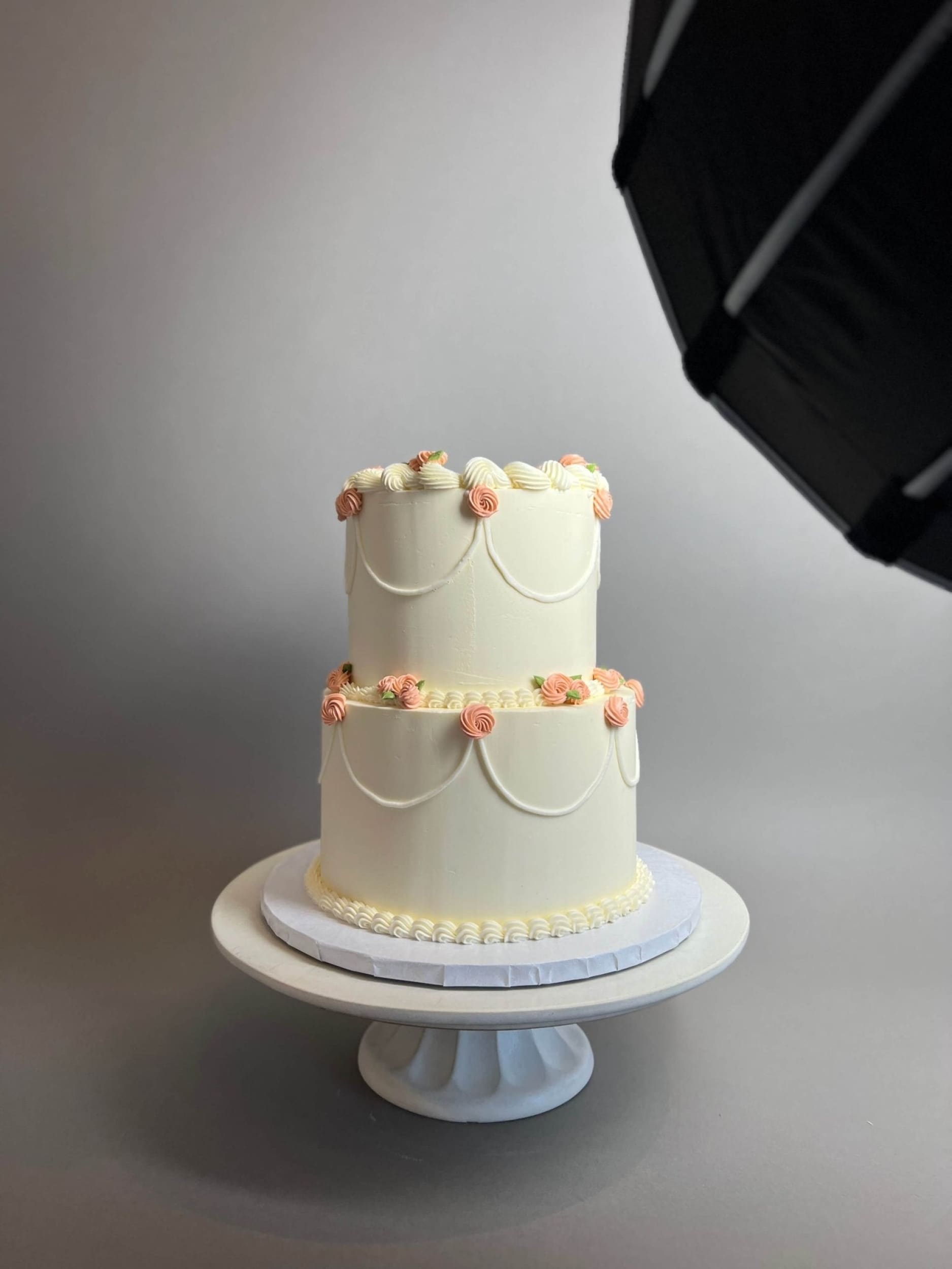 Hand piped mini rosettes on buttercream - custom cake