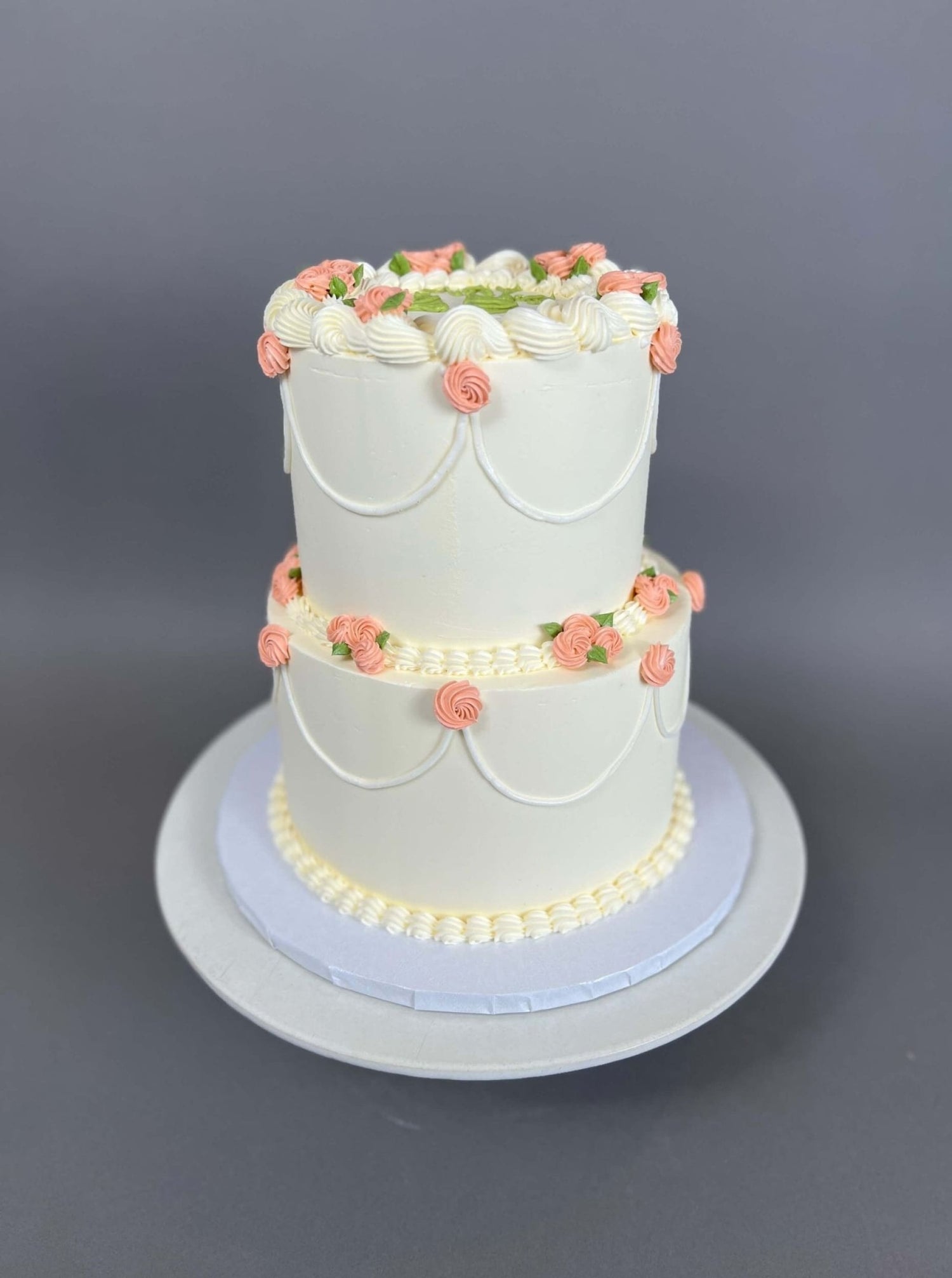 Hand piped mini rosettes on buttercream - custom cake