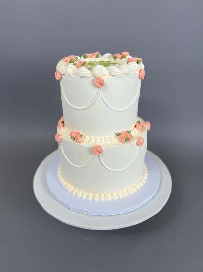 Hand piped mini rosettes on buttercream - custom cake
