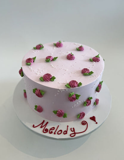 Hand piped mini rosettes on whipped cream - custom cake