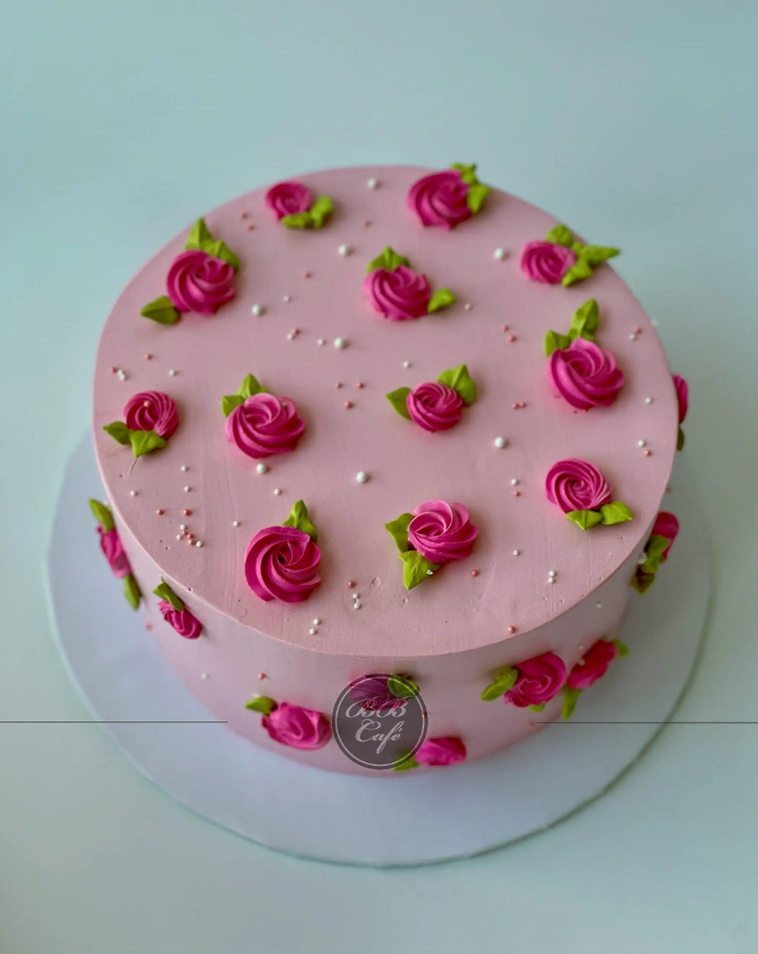 Hand piped mini rosettes on whipped cream - custom cake