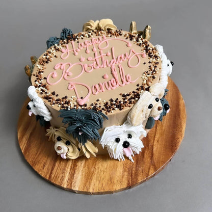 Hand piped puppy party on whipped cream - custom cake