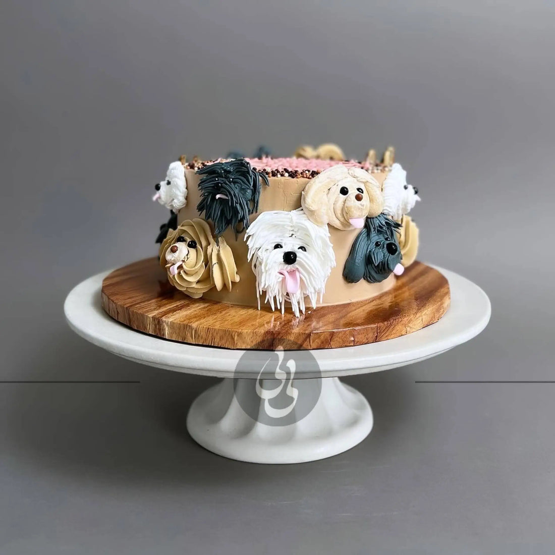 Hand piped puppy party on whipped cream - custom cake