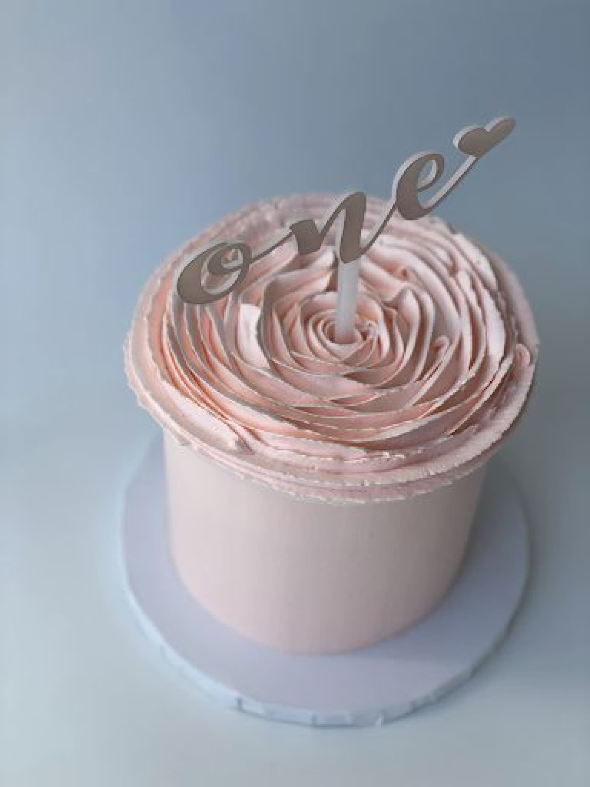 Hand piped ruffled rose on buttercream - custom cake