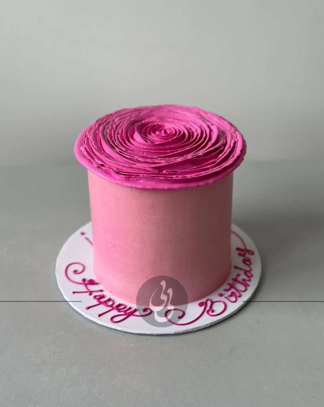 Hand piped ruffled rose on buttercream - custom cake