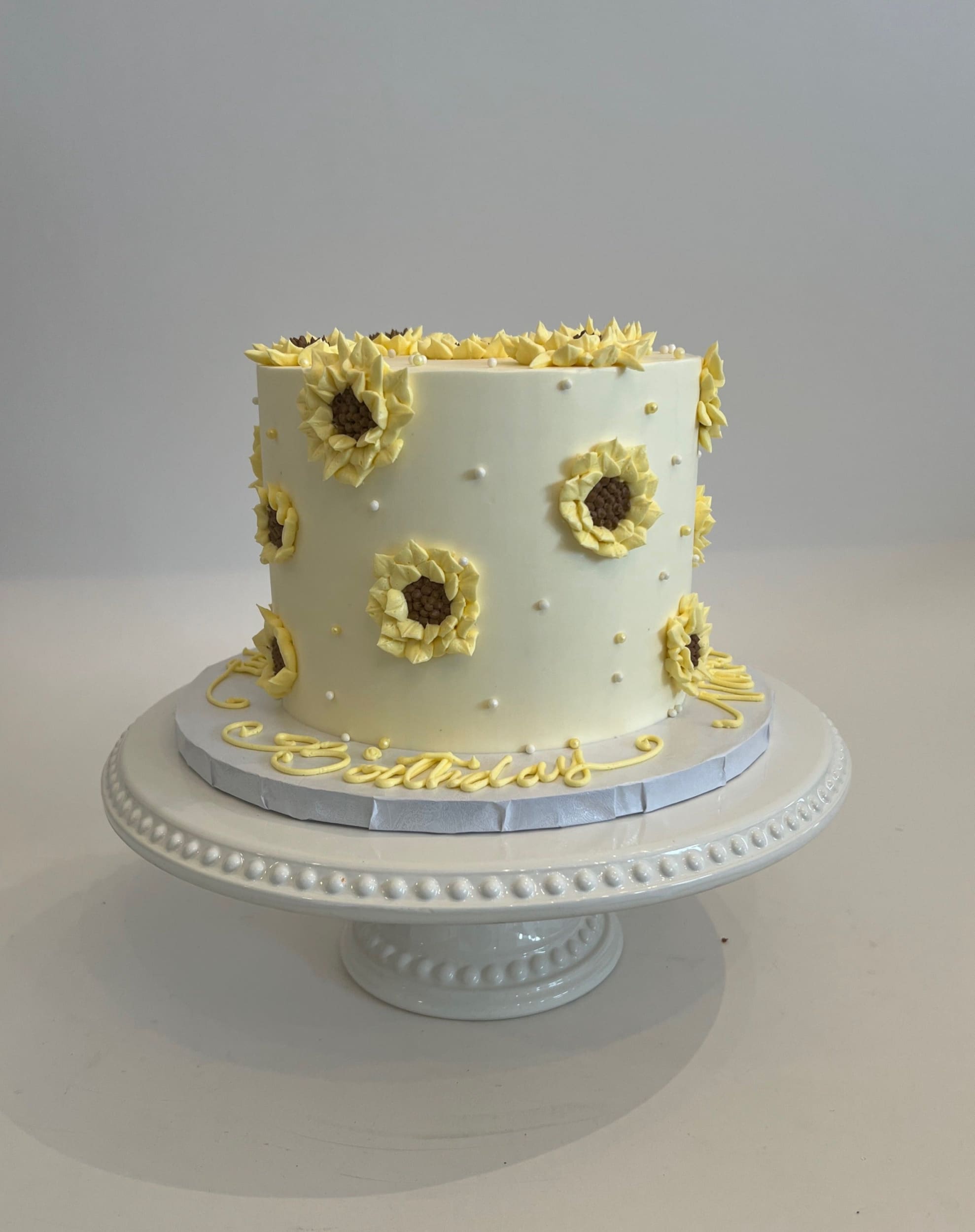 Hand piped sunflowers on buttercream - custom cake