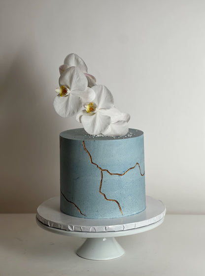 Kintsugi and sugar orchid flowers on buttercream - custom cake