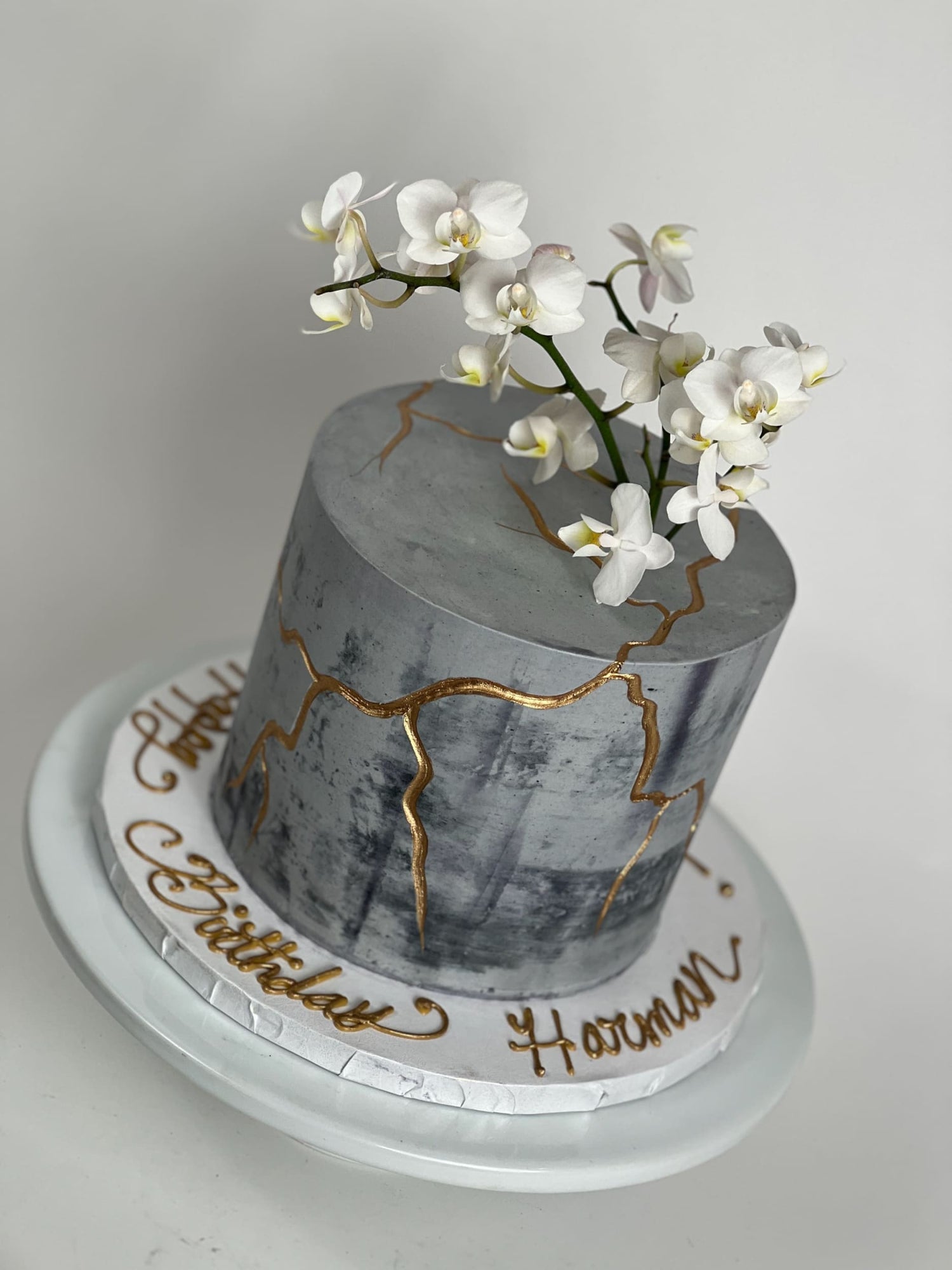 Kintsugi and sugar orchid flowers on buttercream - custom cake
