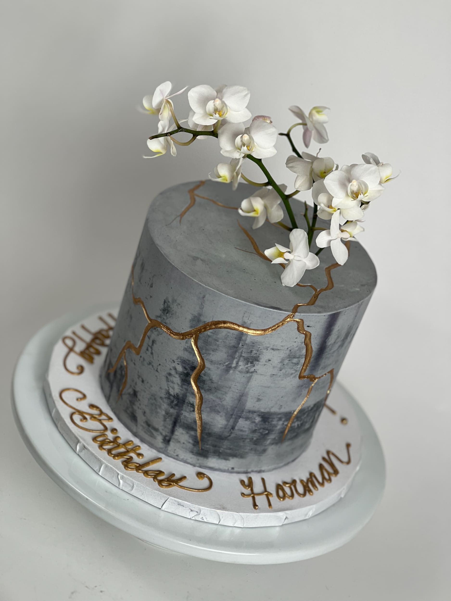 Kintsugi and sugar orchid flowers on buttercream - custom cake