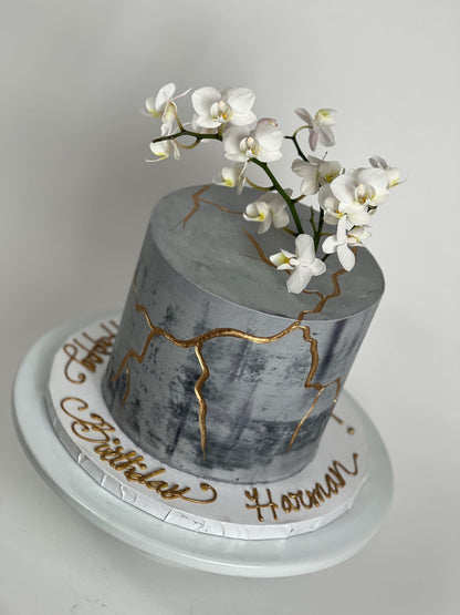 Kintsugi and sugar orchid flowers on buttercream - custom cake