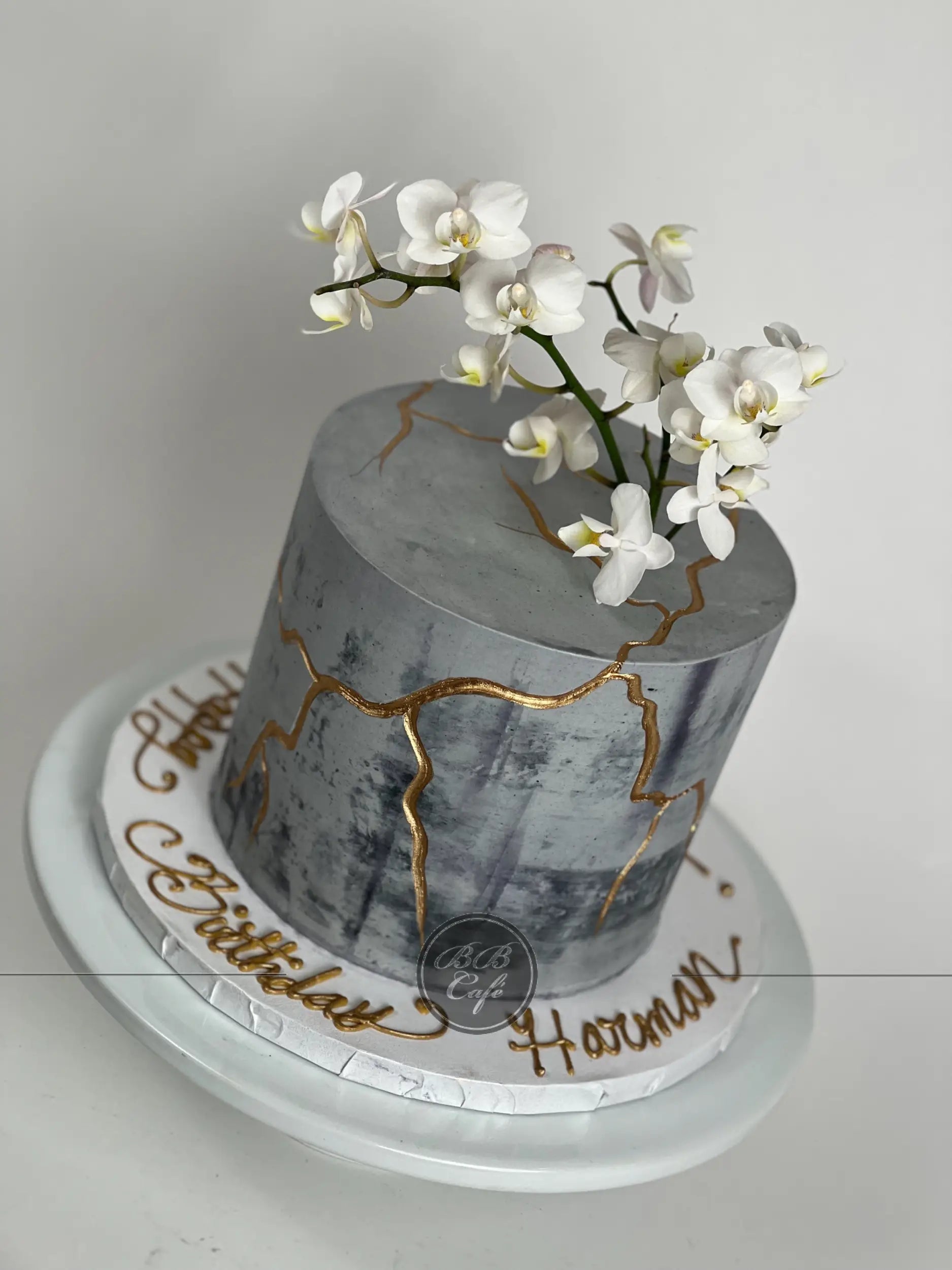 Kintsugi and sugar orchid flowers on buttercream - custom cake