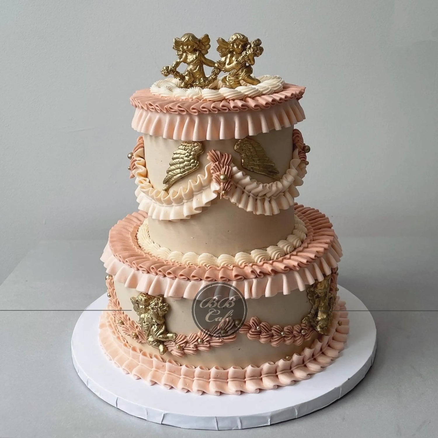 Lambeth angels &amp; frills on buttercream - custom cake