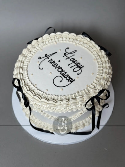 Lambeth &amp; bows on buttercream - custom cake