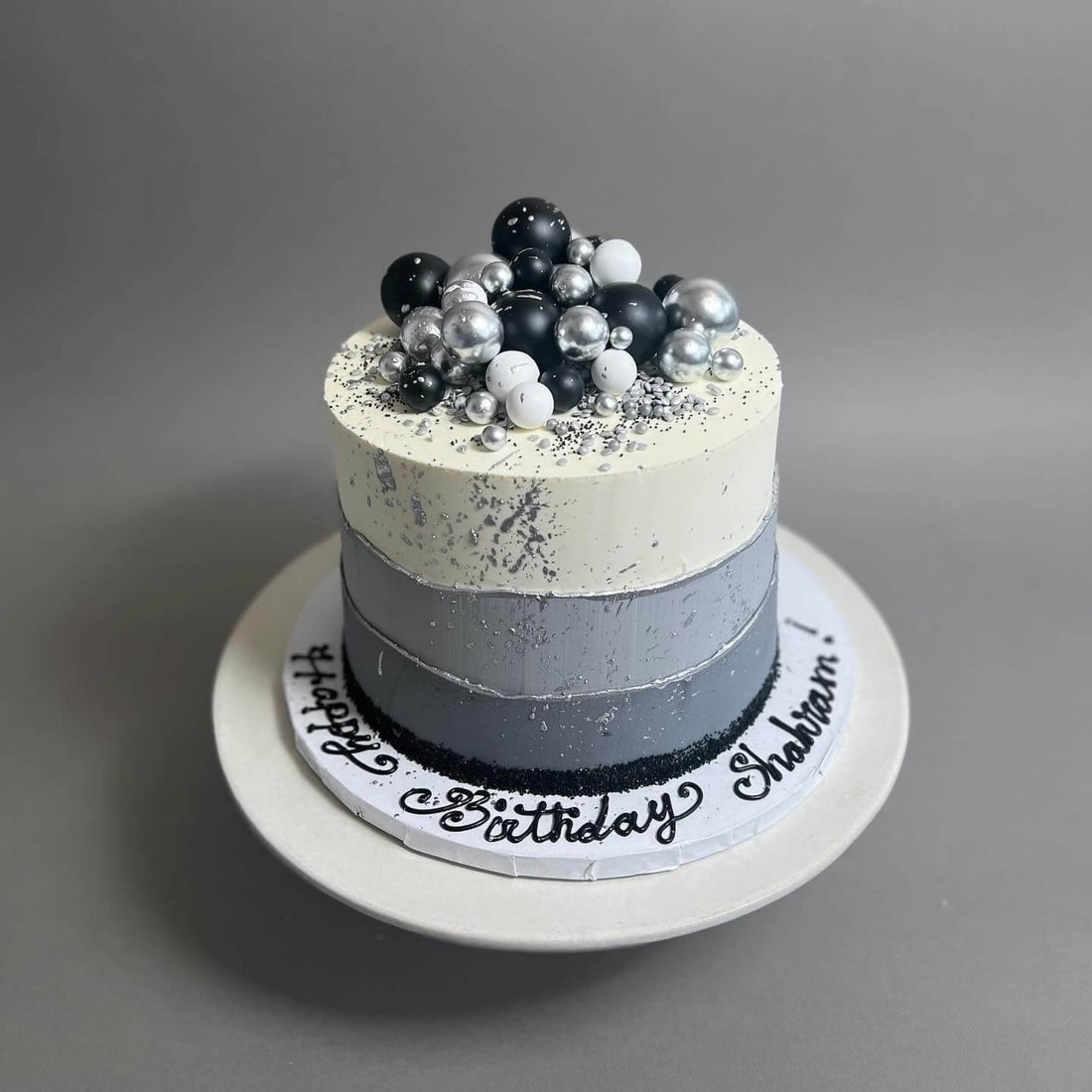 Layered spheres on buttercream - custom cake