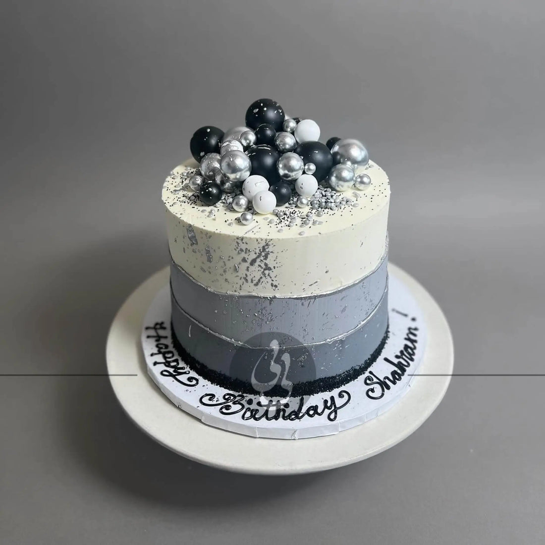 Layered spheres on buttercream - custom cake