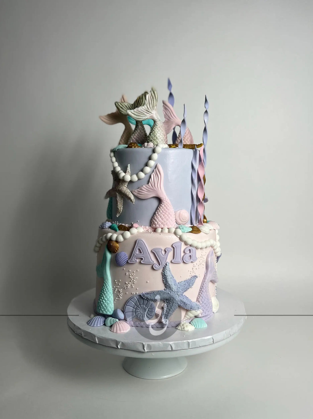 Mermaid tails on buttercream - custom cake