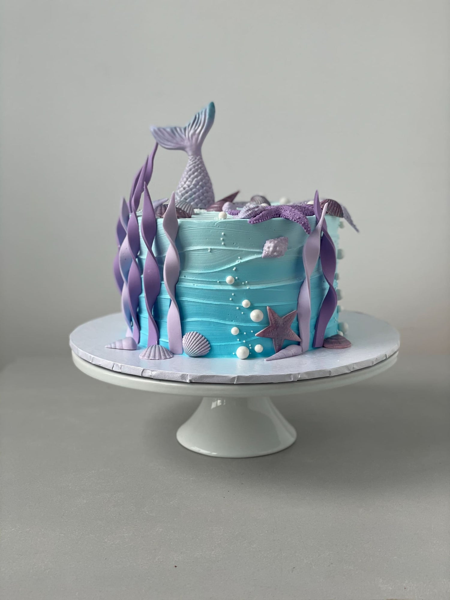 Mermaid tails on buttercream - custom cake