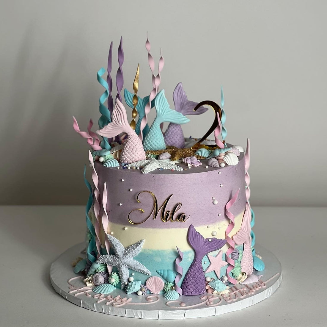 Mermaid tails on buttercream - custom cake