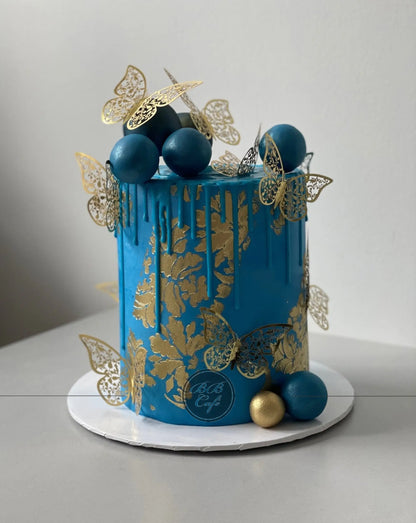 Metallic butterflies &amp; drips on buttercream - custom cake