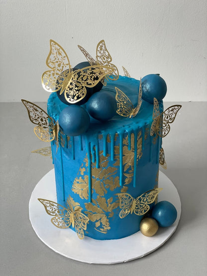 Metallic butterflies &amp; drips on buttercream - custom cake