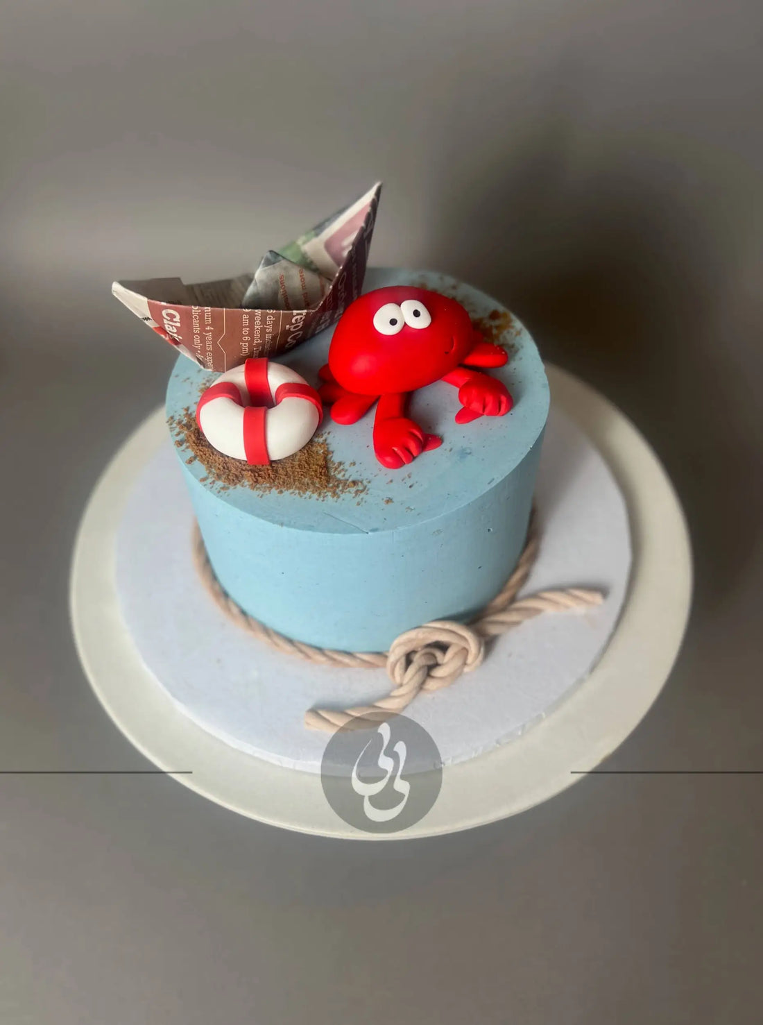 Nautical sea crab &amp; paper boat - custom cake