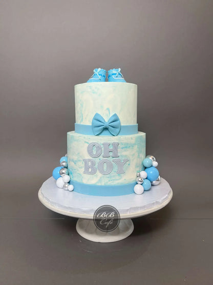 Oh baby booties on marble buttercream - custom cake