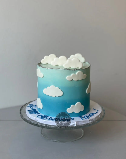 Ombre on buttercream with fondant decor - custom cake