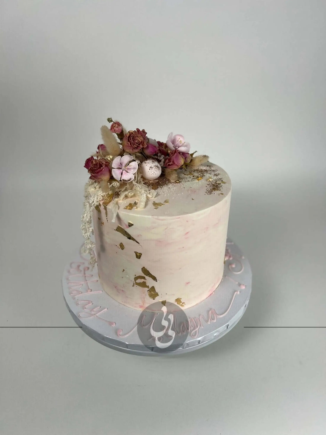 Preserved flowers on marble buttercream - custom cake