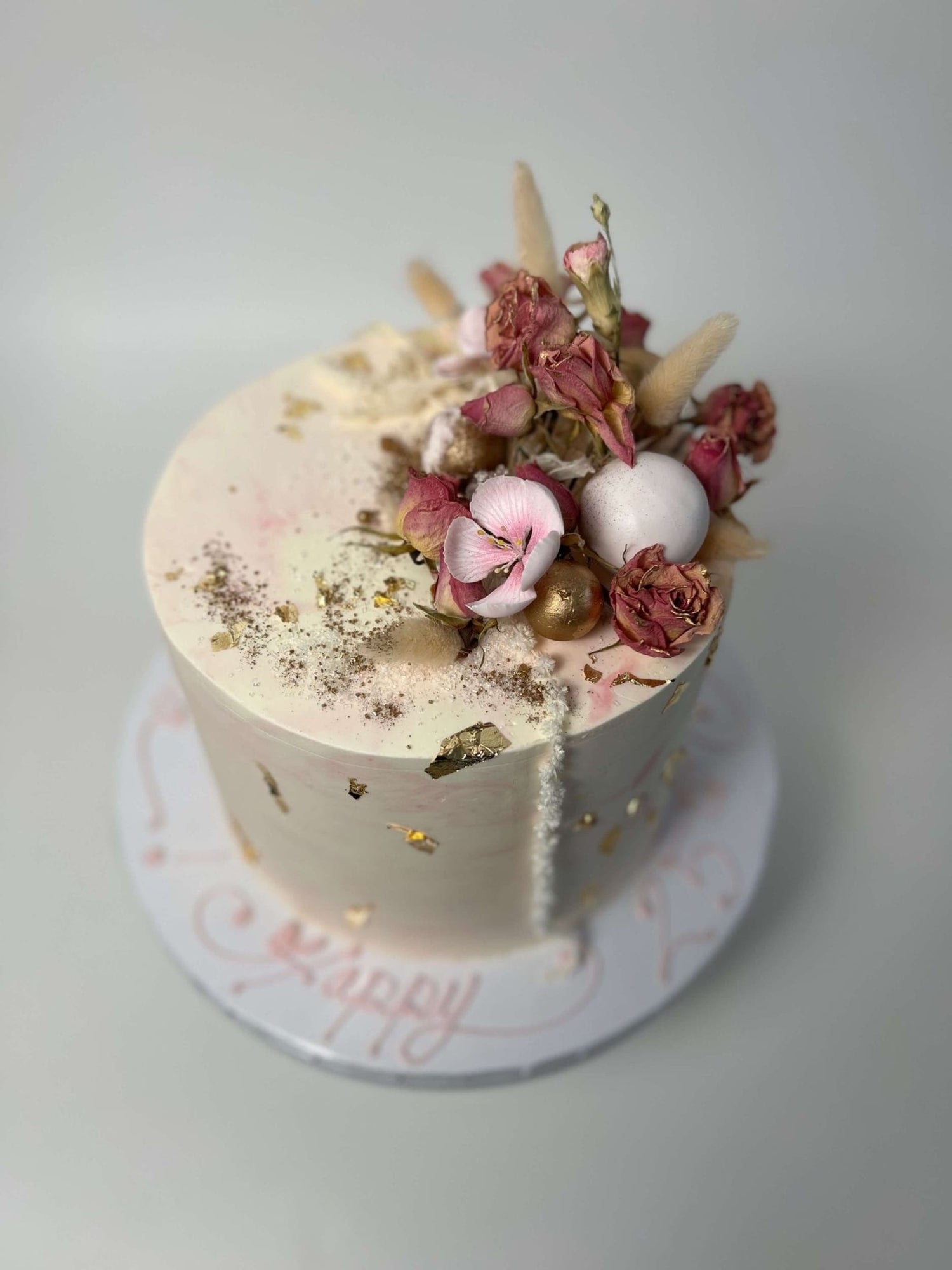 Preserved flowers on marble buttercream - custom cake