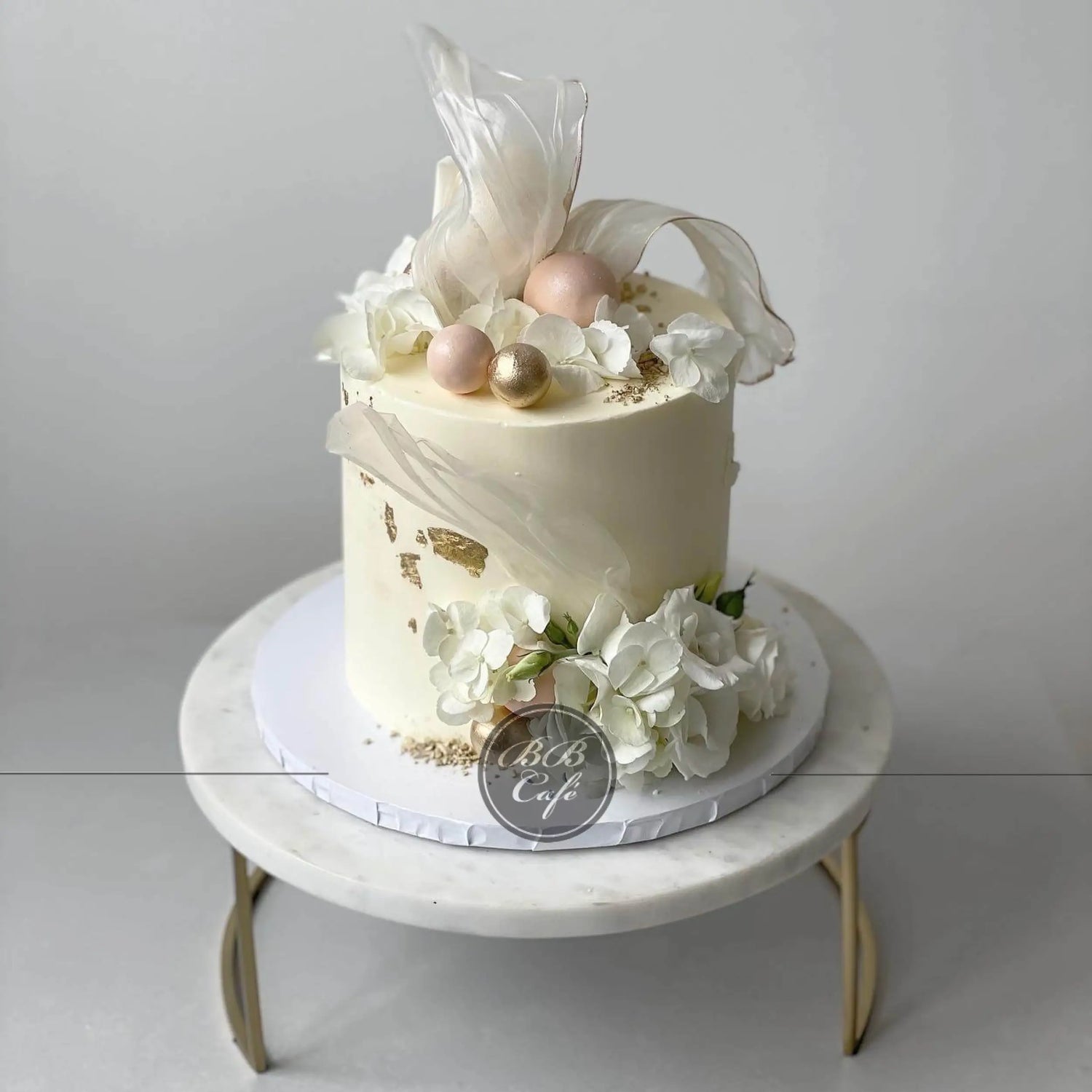 Rice paper sails floral on buttercream - custom cake