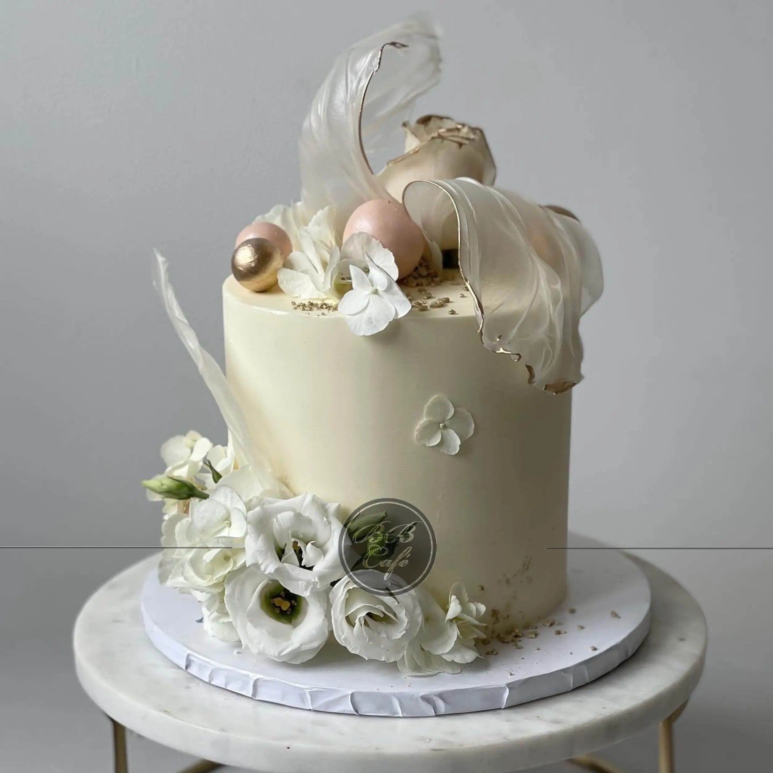 Rice paper sails floral on buttercream - custom cake