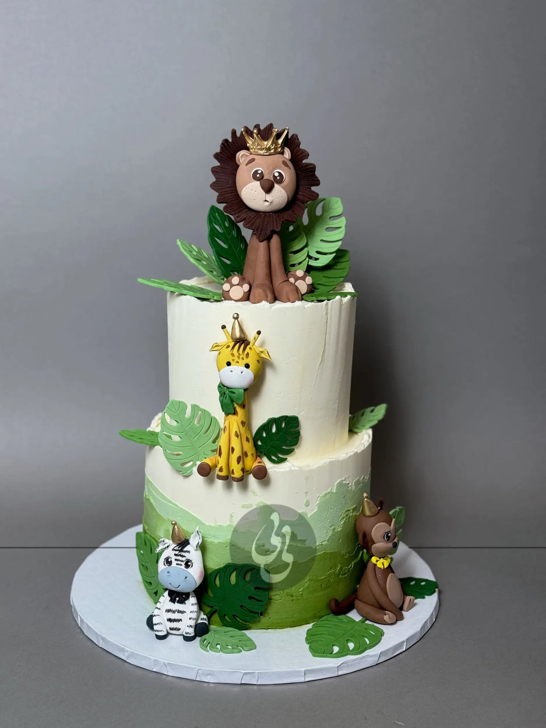 Safari animals &amp; leaves - custom cake