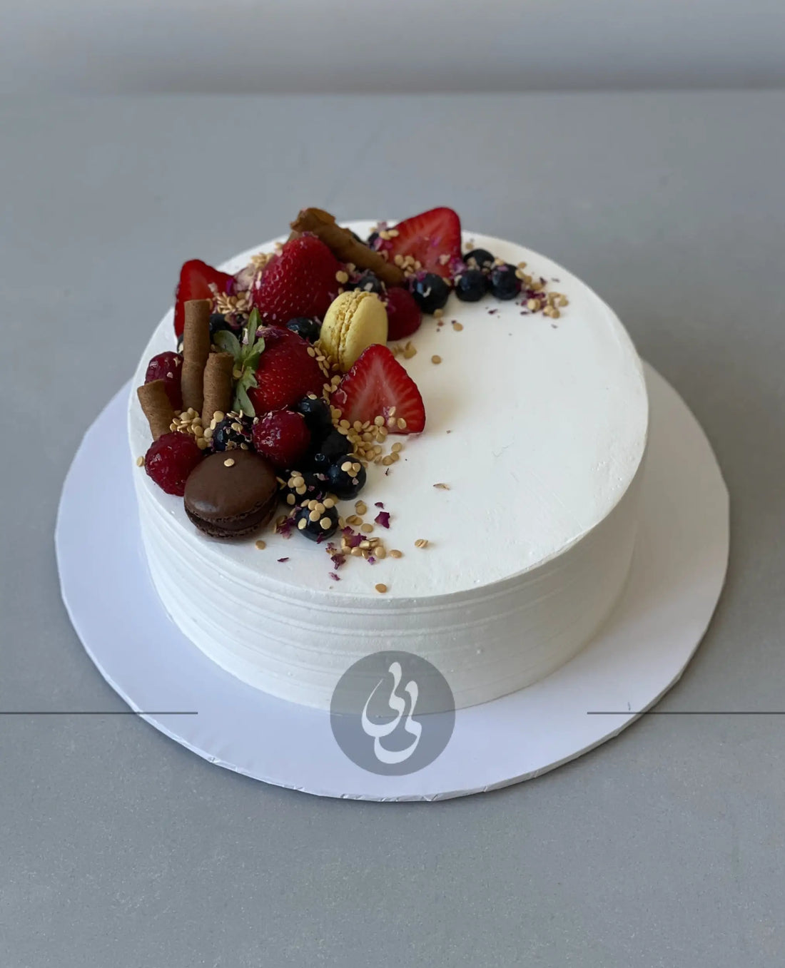 Seasonal fruits on whipped cream - custom cake