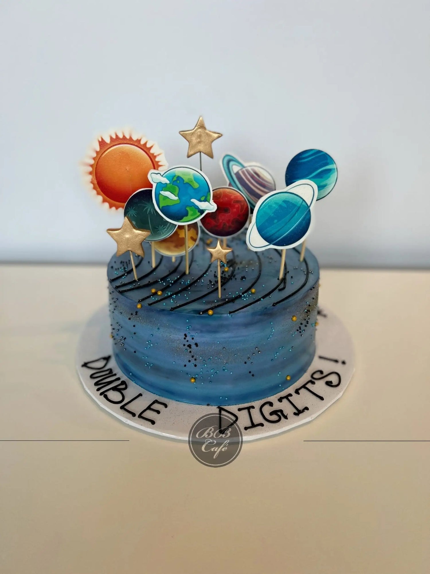 Solar system edible print on whipped cream - custom cake