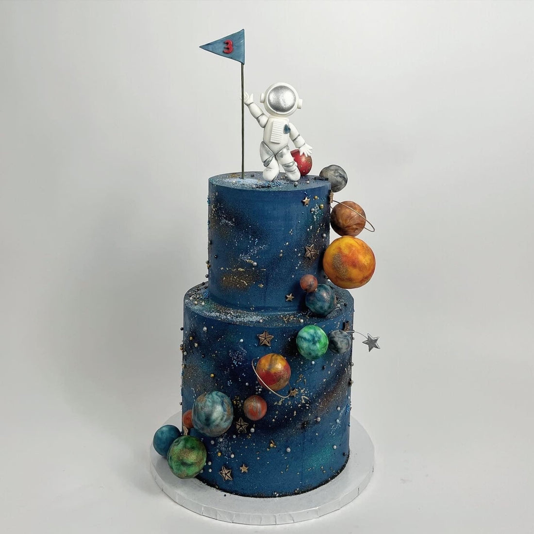 Space astronaut &amp; planets on buttercream - custom cake
