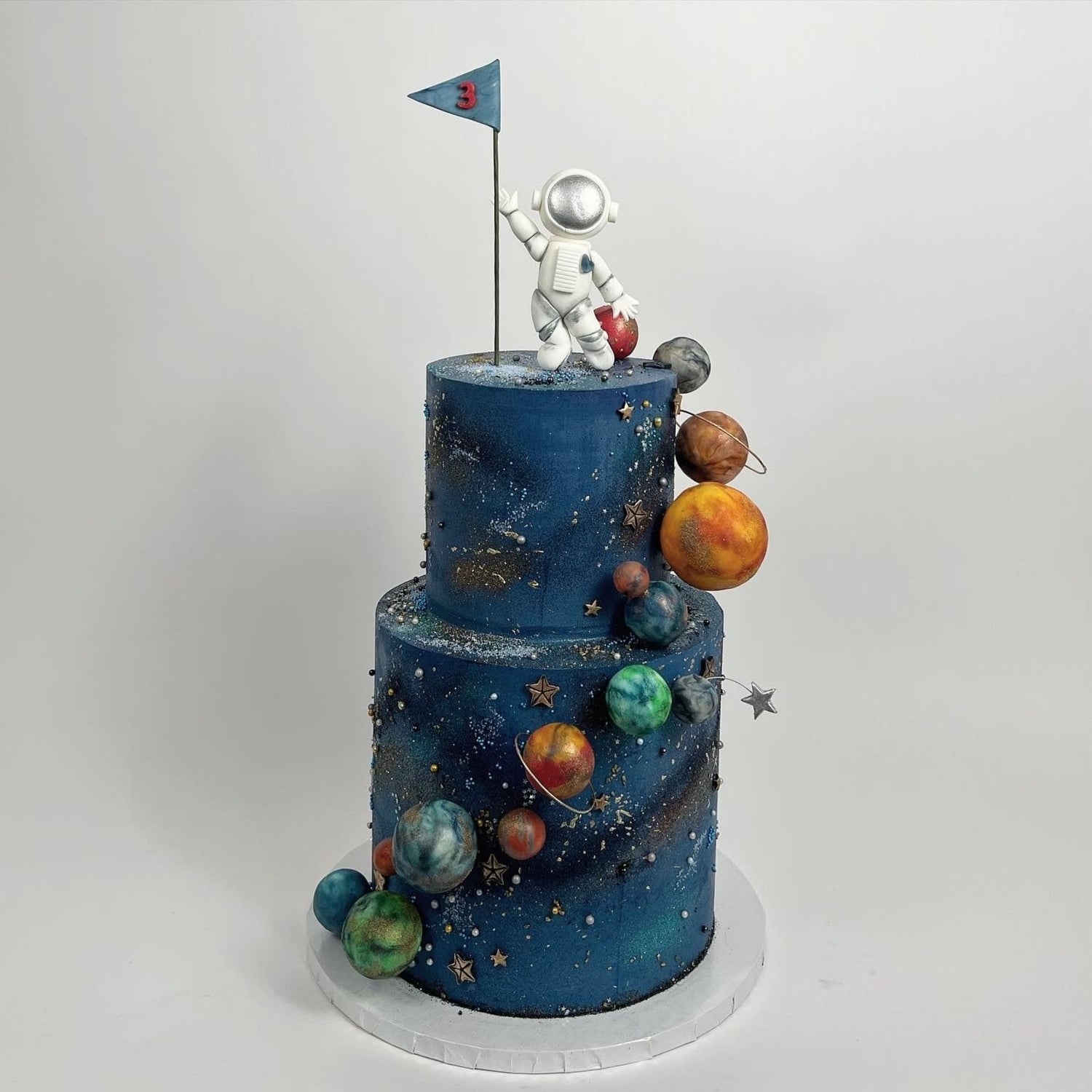 Space astronaut &amp; planets on buttercream - custom cake