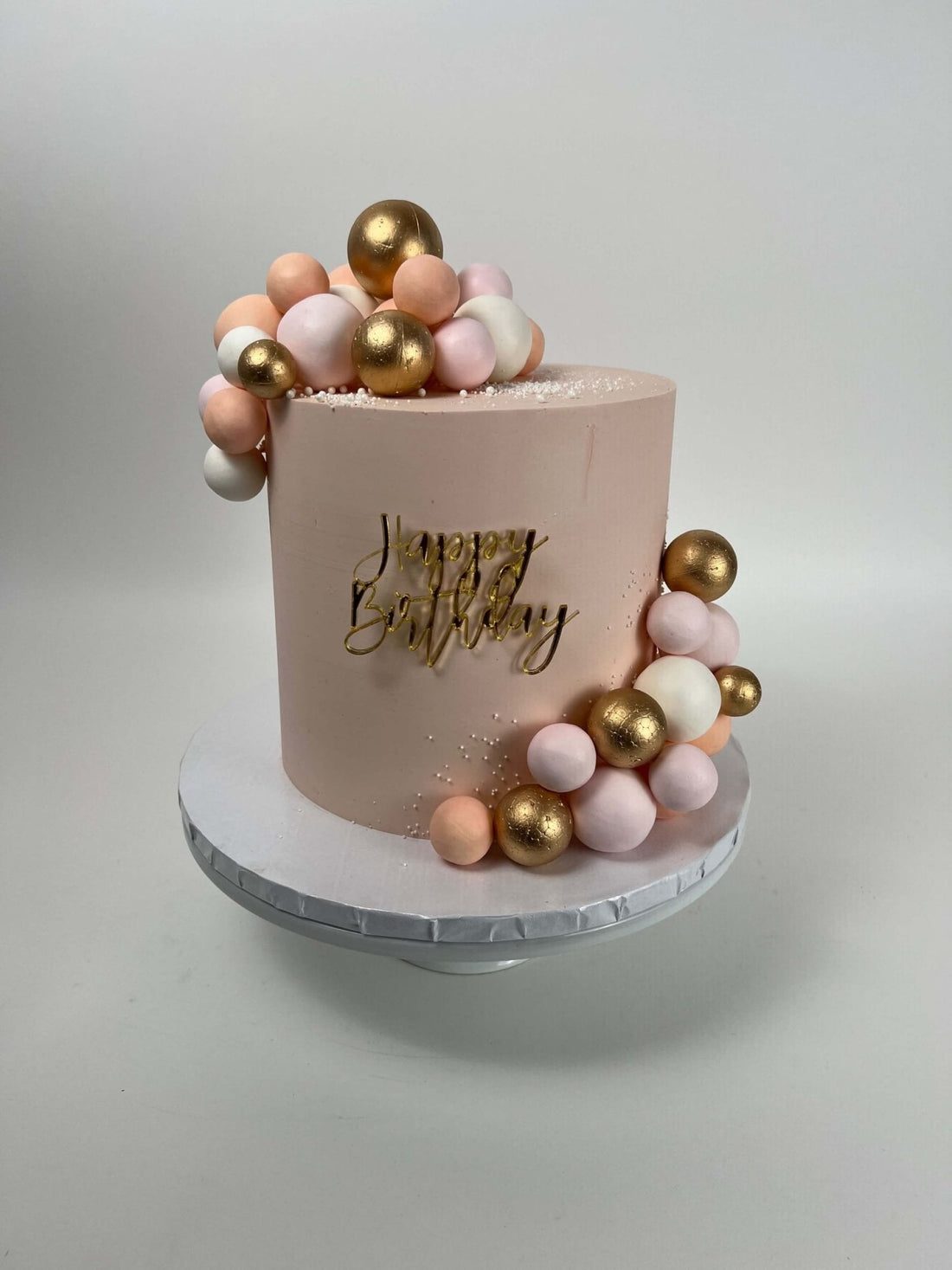 Spheres on buttercream - custom cake