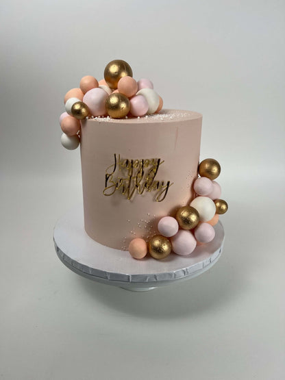 Spheres on buttercream - custom cake