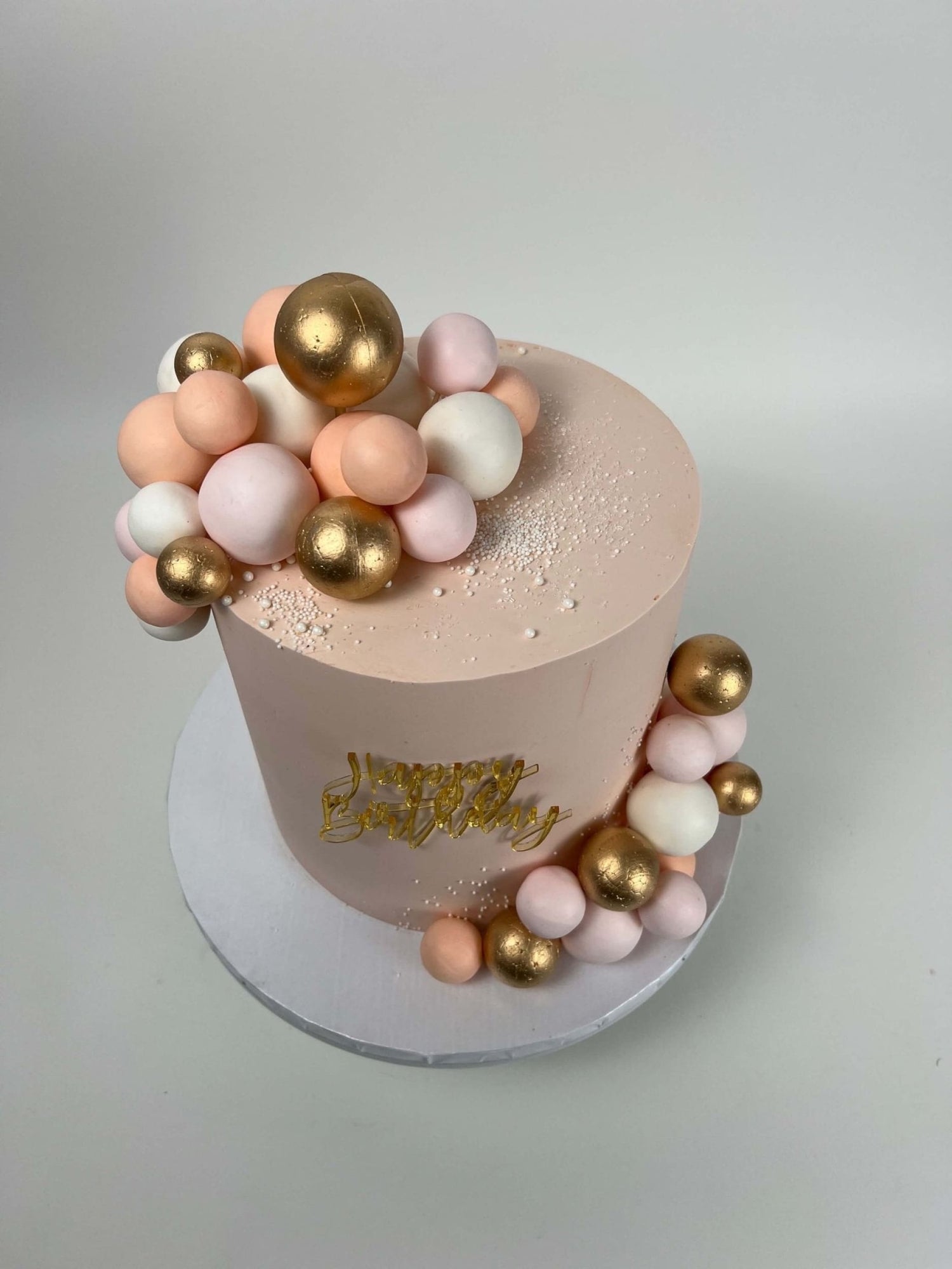 Spheres on buttercream - custom cake