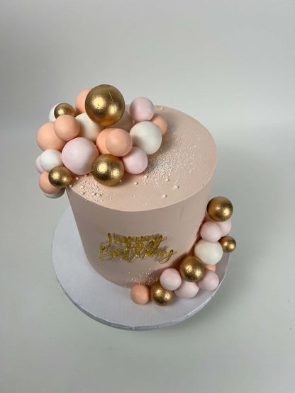 Spheres on buttercream - custom cake