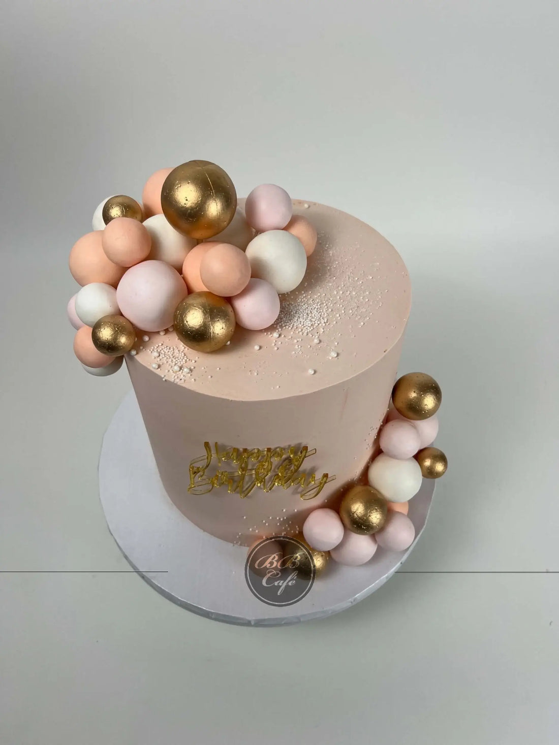 Spheres on buttercream - custom cake