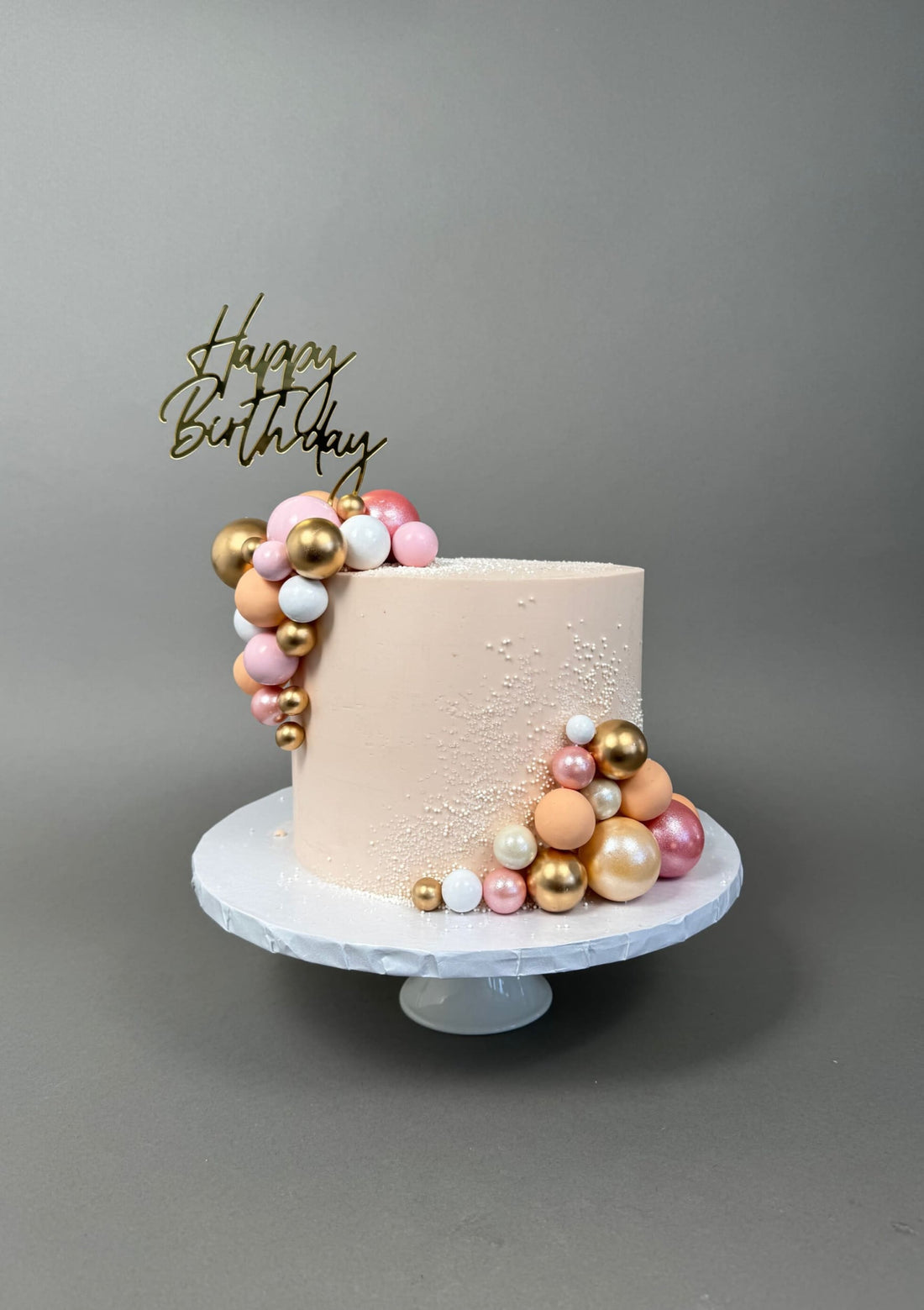 Spheres on buttercream - custom cake