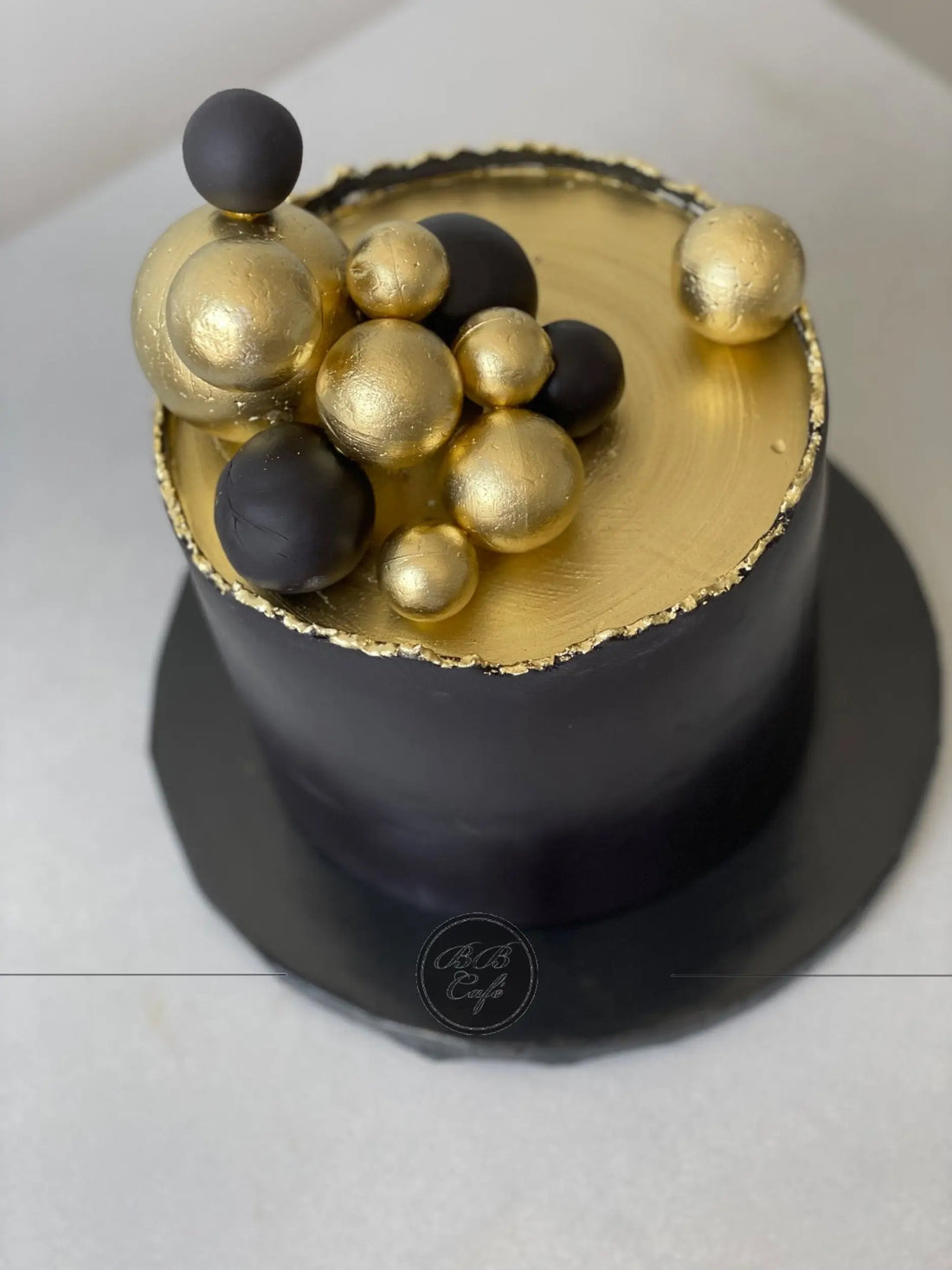 Spheres on deckled edge fondant - custom cake