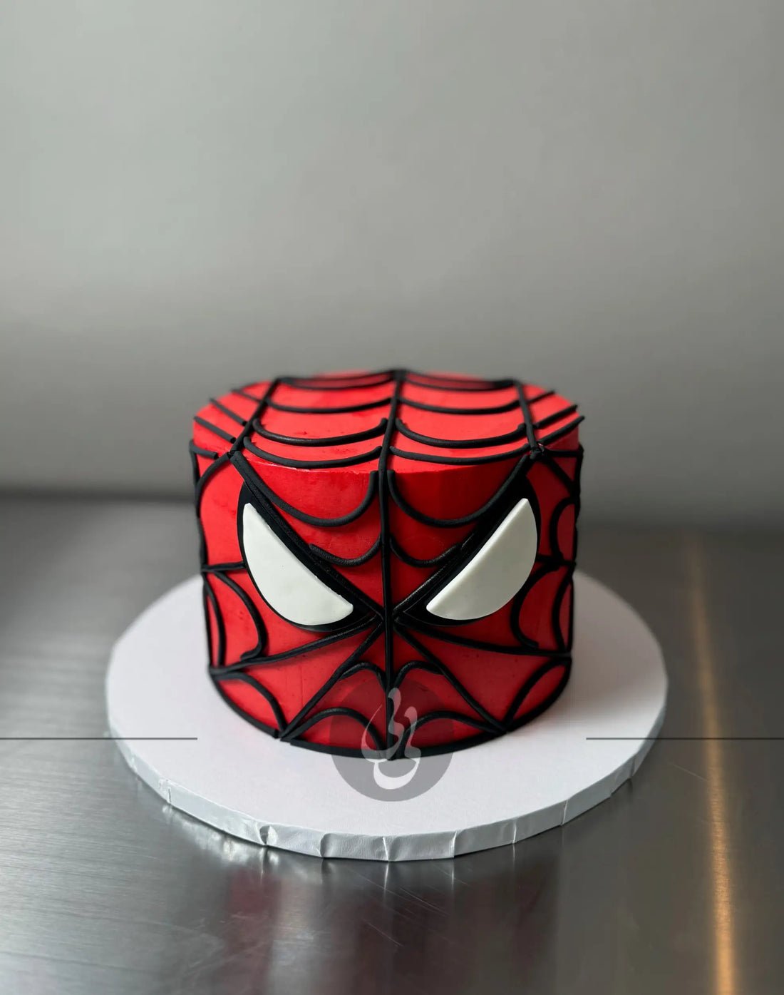 Spiderman face on buttercream - custom cake