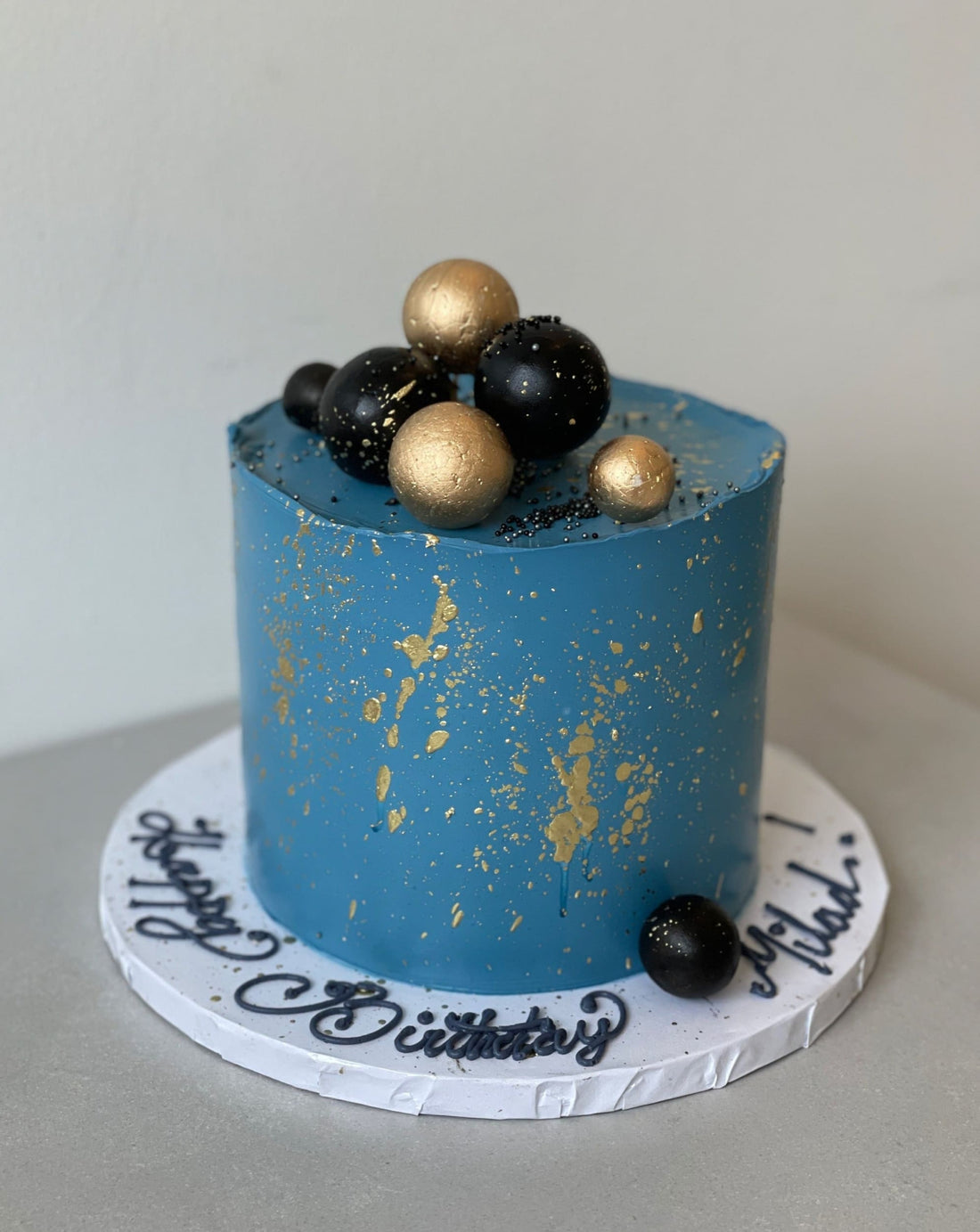 Splashed & textured spheres on buttercream - custom cake