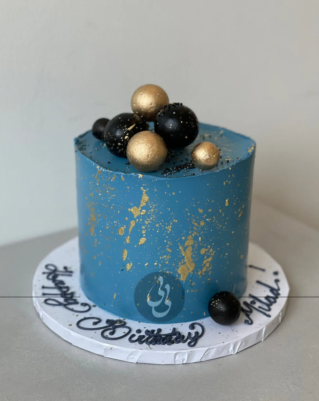 Splashed & textured spheres on buttercream - custom cake