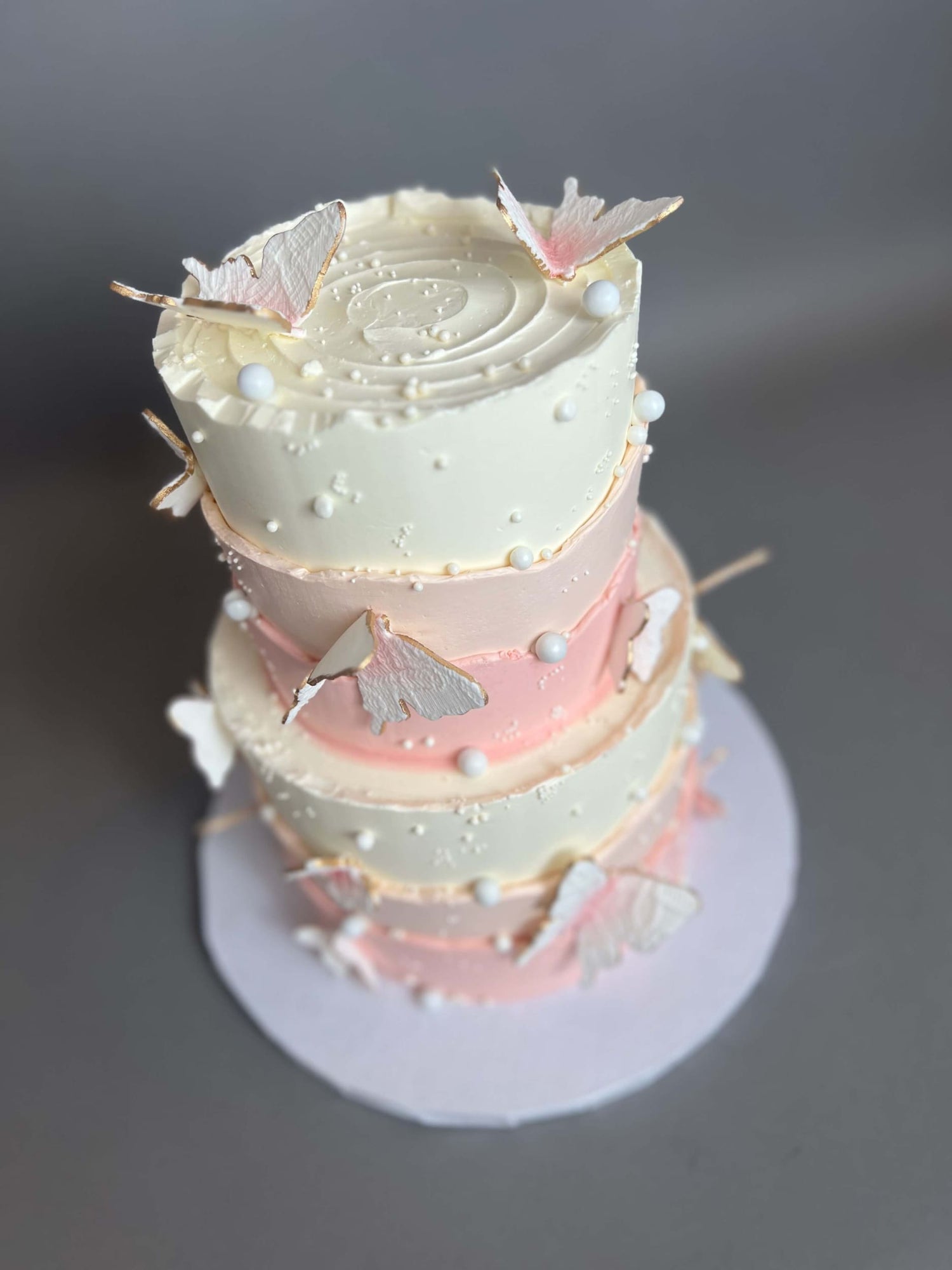 Sugar butterflies on layered buttercream - custom cake