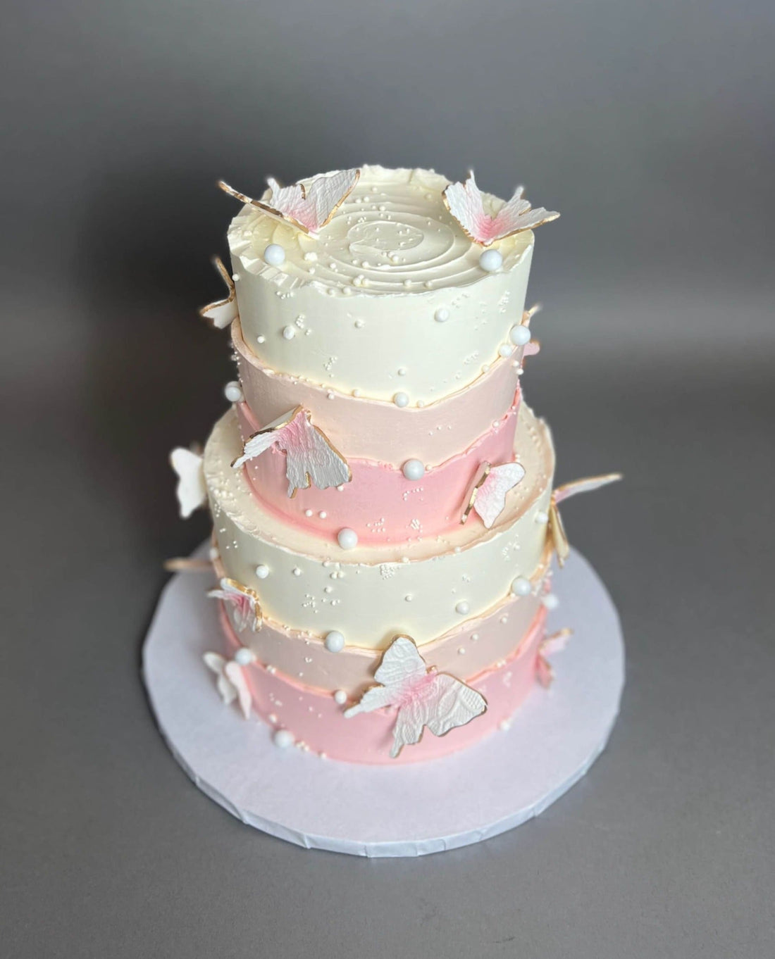 Sugar butterflies on layered buttercream - custom cake